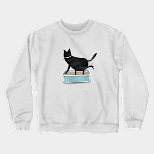 Cartoon black cat with cat litter box and the inscription "let it snow". Crewneck Sweatshirt